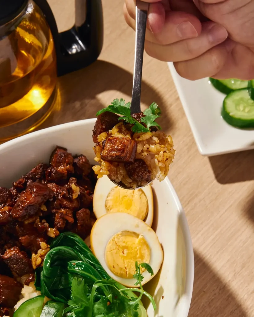 Pork dish with boiled eggs, a menu of Shin lin philippines resturant.