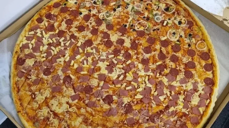 Pizza with extra toppings, a menu of big guys philippines resturant.